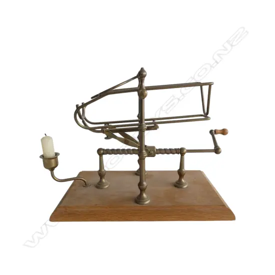Port wine decanting cradle brass frame w screw tip drive & candle. On oak base. L.330mm
