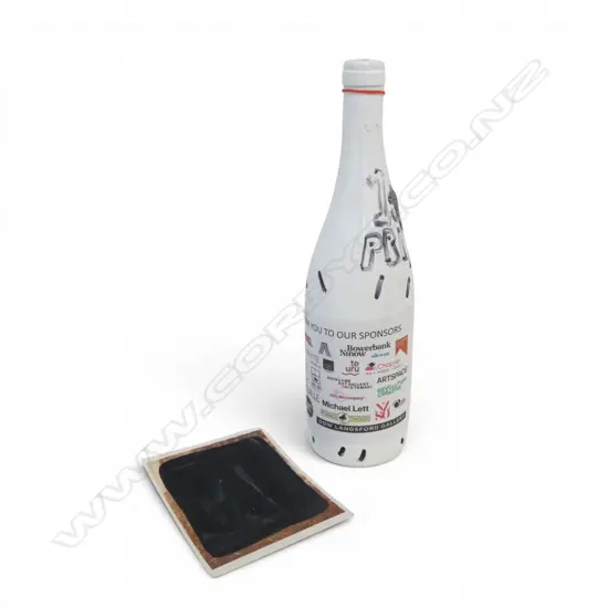 JOHN REYNOLDS, 1st PRIZE WINE BOTTLE w. SPONSORS LABEL, CARD w. SIGNATURE & DATE 5.5.19, H.300mm