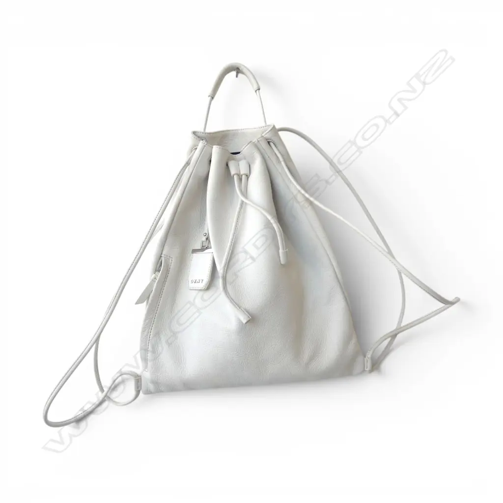 LARGE WHITE LEATHER DKNY DOUFFEL BAG w maker's tag. With back pack straps Image 1++