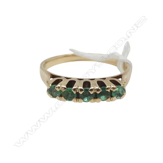 9CT GOLD & EMERALD BRIDGE RING2.4GMS ONE EMERALD DAMAGED size O