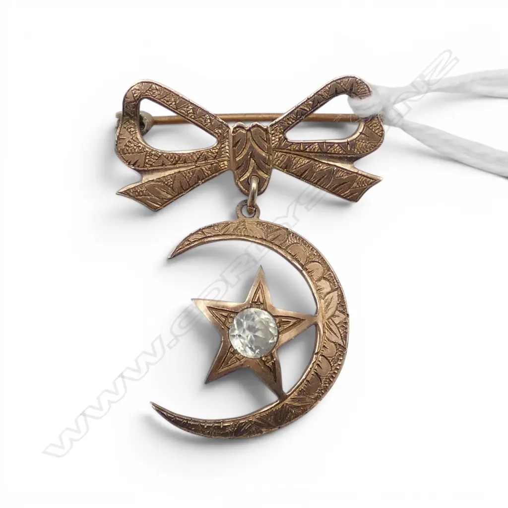 9ct GOLD star & crescent BROOCH set w WHITE TOPAZ. Bow suspended 3.38gms Image 1++