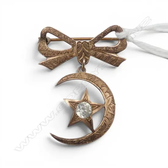 9ct GOLD star & crescent BROOCH set w WHITE TOPAZ. Bow suspended 3.38gms