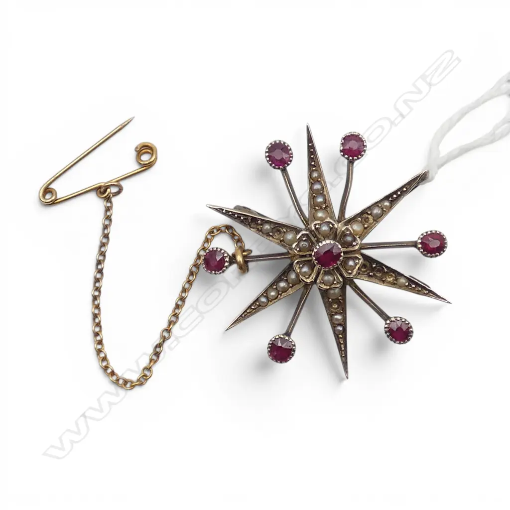 VICTORIAN 9CT RUBY AND SEED PEARL STAR BROOCH 5.30gms SOME SEED PEARLS MISSING Image 1++