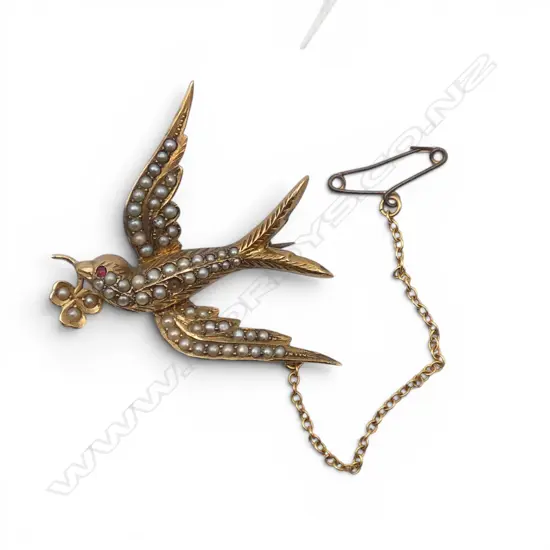 EDWARDIAN 15CT GOLD AND SEED PEARL SWALLOW BROOCH (one pearl missing) 5.65gms