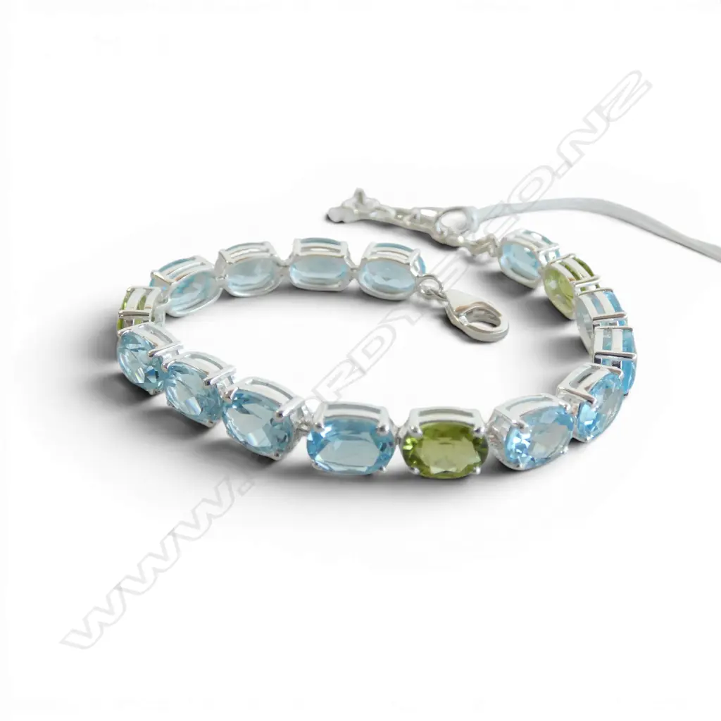 SILVER PERIDOT & BLUE TOPAZ BRACELET Image 1++