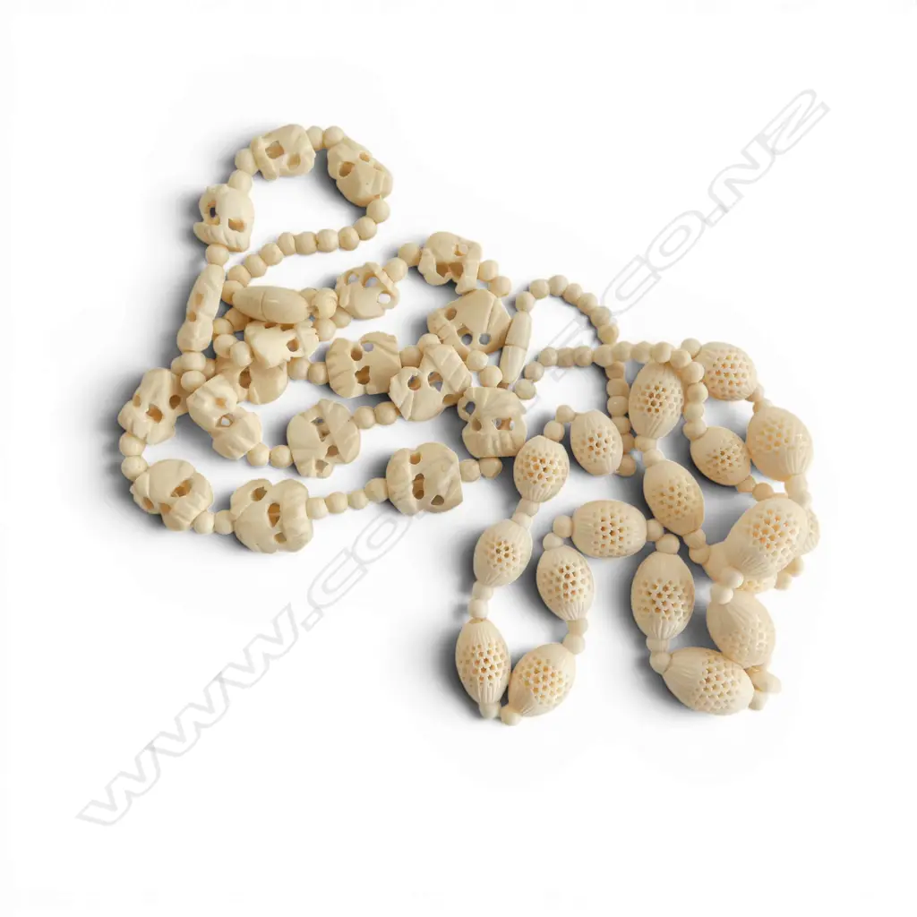 2 CARVED BONE VINTAGE NECKLACES 1 w pierced spheres the other w elephants Image 1++