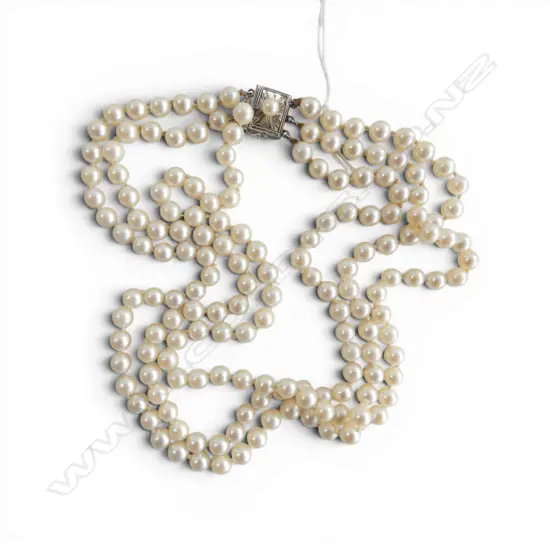 Rare Uniform triple strand CULTURED PEARL NECKLACE L.400mm. With silver L.360mm.clasp.