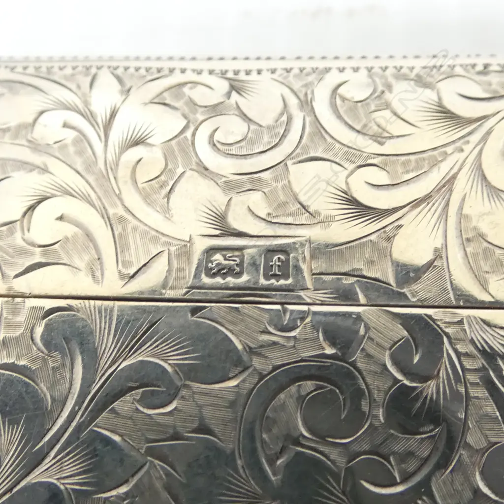 A quality silver leafy scroll engraved card case. Birmingham 1905. 57.9gms. Image 1++