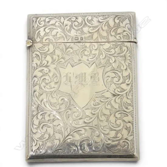A quality silver leafy scroll engraved card case. Birmingham 1905. 57.9gms.