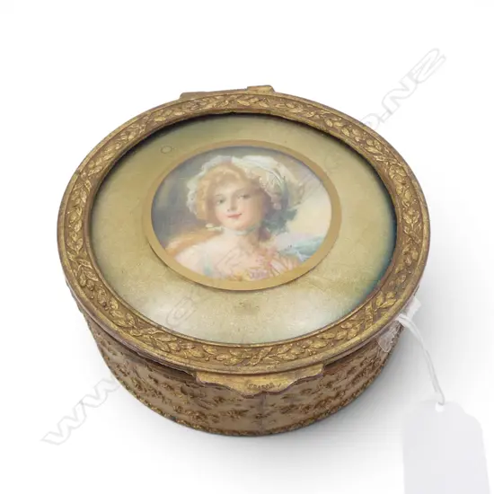VINTAGE FRENCH GILT METAL JEWEL BOX with printed portrait miniature young woman panelled lid. Dia.110mm.