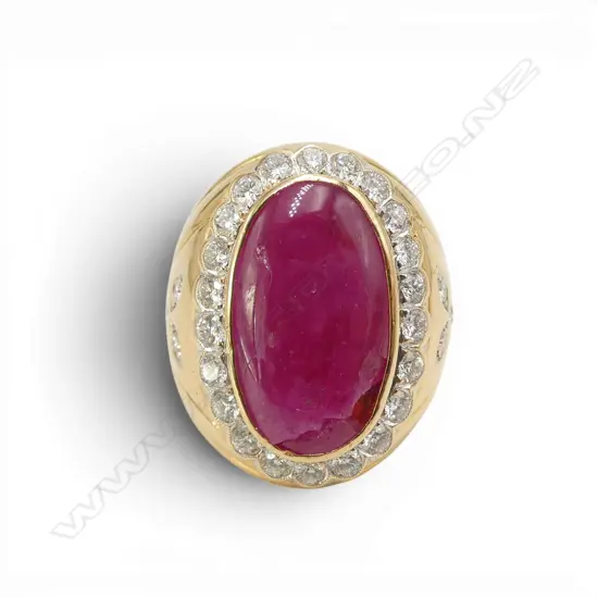 18ct gold and very large ruby (ruby faulted) and multi diamond (TDW. 2.2cts) ring. 24gms. SIZE X