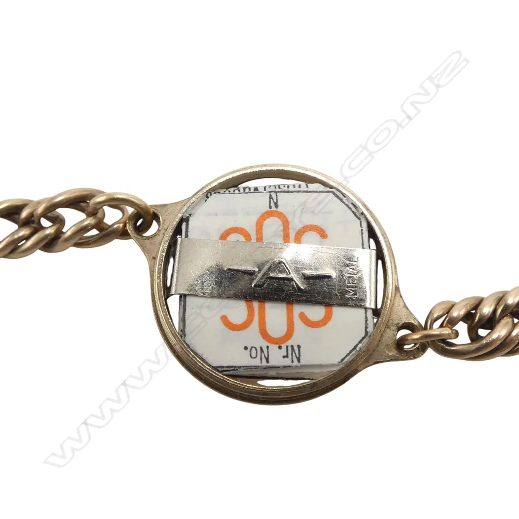 9CT 'SOS TALISMAN' BRACELET some wear. Top unscrews w persons details. gold weight 20gms Image 1++