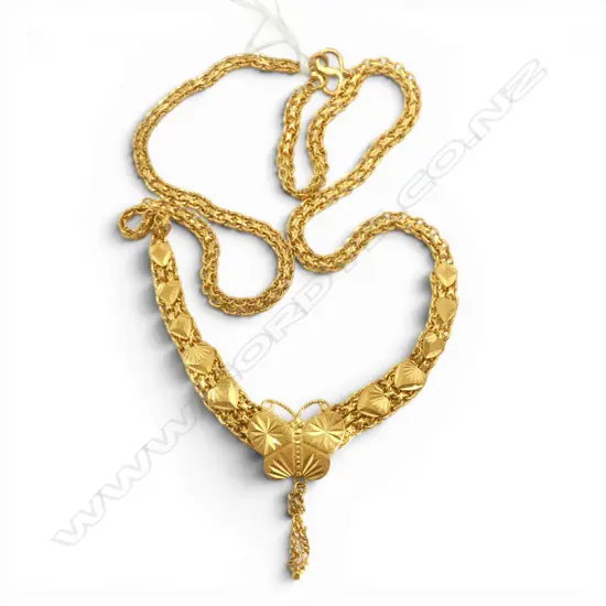 22ct yellow gold necklace. The tapered front set with a butterfly. 21.8gms.