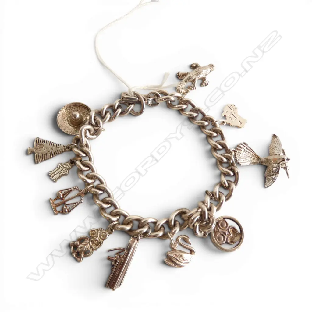 STG SILVER CHARM BRACELET 57gms Image 1++