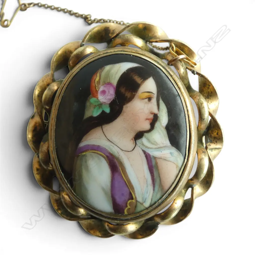 19thC hand painted portrait brooch rolled gold dble twist frame. H.60mm Image 1++