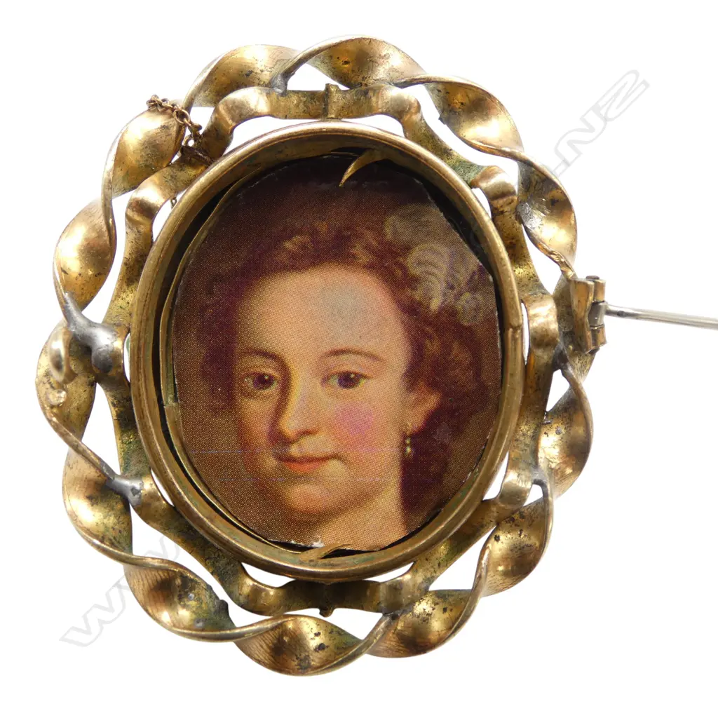 19thC hand painted portrait brooch rolled gold dble twist frame. H.60mm Image 1++