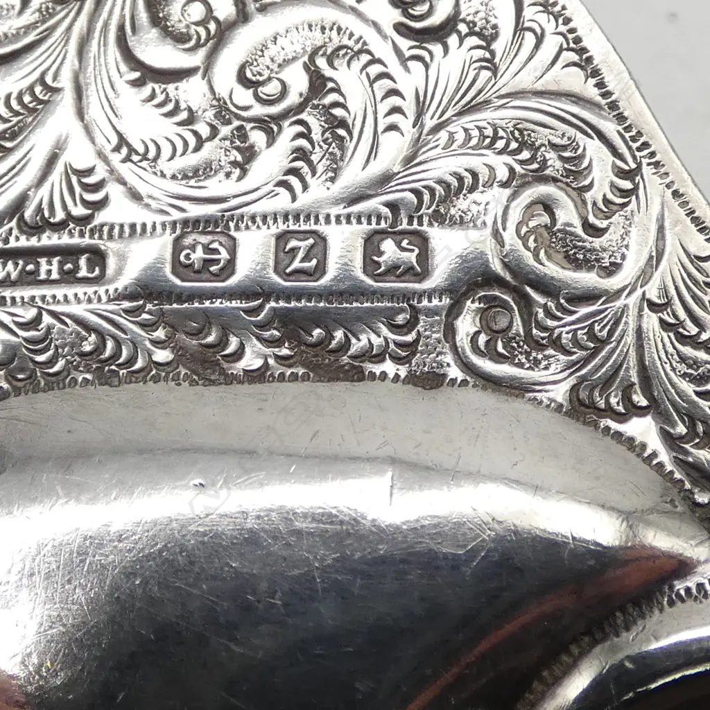 Victorian Birmingham 1899 silver scallop dish. Fern scroll engraved handle. Ball feet. Birmingham 1899. 54gms. Image 1++