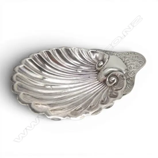 Victorian Birmingham 1899 silver scallop dish. Fern scroll engraved handle. Ball feet. Birmingham 1899. 54gms.