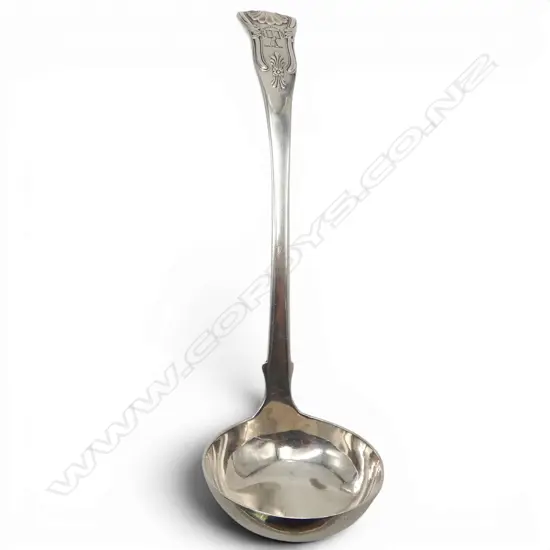 George IV Scottish silver sauce ladle. King's pattern. Crested 'Mens Immota Manet' above a book held by a hand. 36gms.