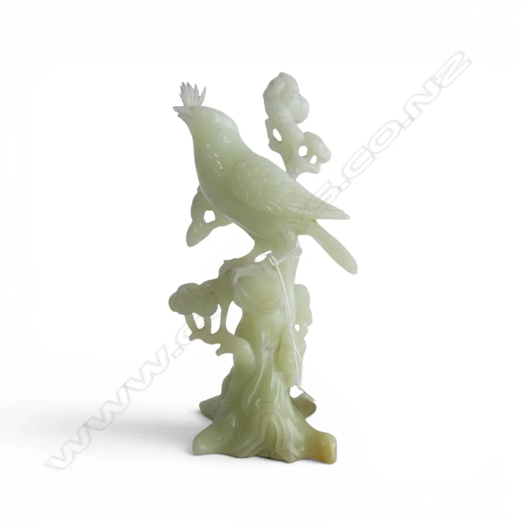 CHINESE PALE GREEN JADE CARVED BIRD ON PINE TREE. creamy tone. Well carved. Tiny chip to lower beak. H.195mm. Image 1++