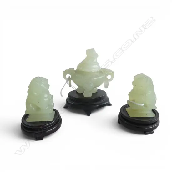 3 CHINESE PALE GREEN SMALL CARVINGS: PR SEATED LIONS on stands + lidded censor lion finial & mask & ring handles. H.90mm