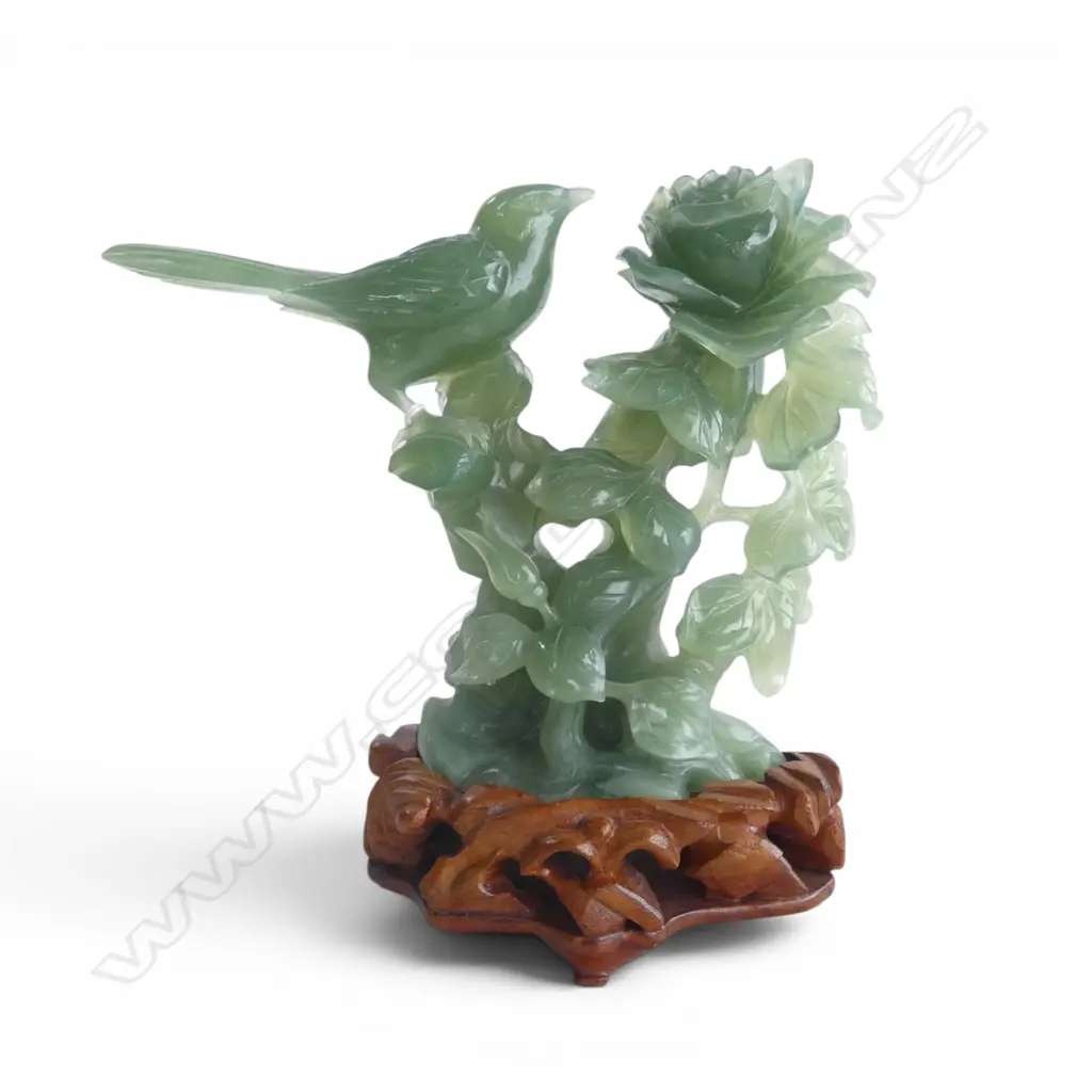 CHINESE PALE GREEN JADE CARVED BIRD ON A LEAFY ROSE BRANCH. Semi translucent mid green tone. On stand. H.205mm. Image 1++