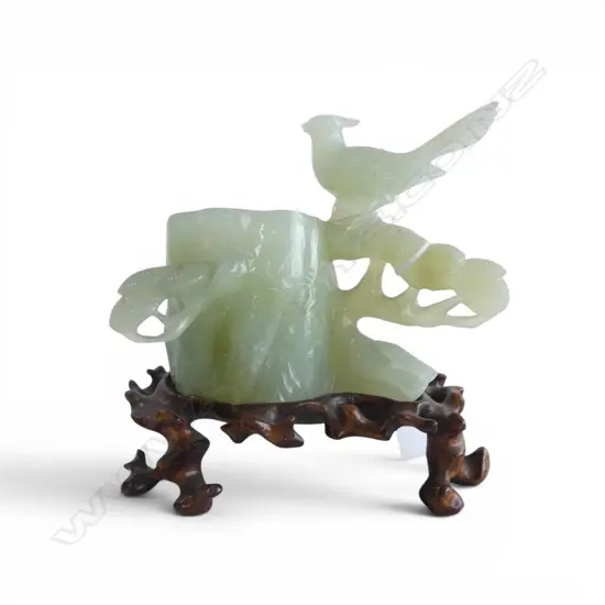 ELEGANT CHINESE PALE GREEN JADE CARVING OF A PINE TRUNK VASE W RAISED BIRD. On sinuous carved stand. H.130mm