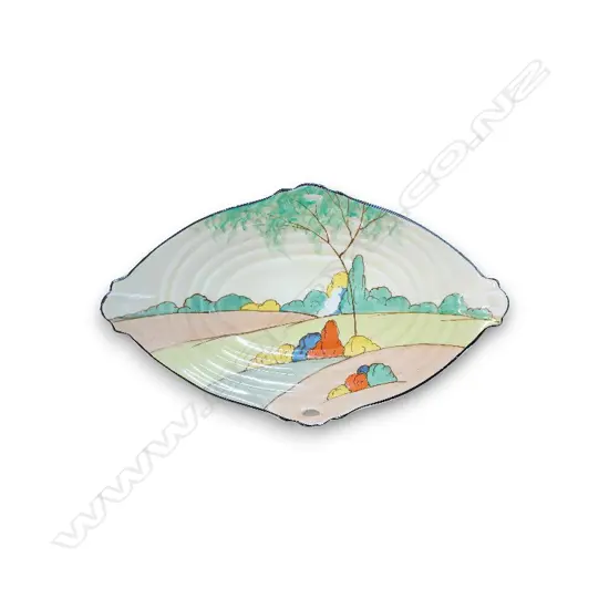 ROYAL FALCON WARE PLATE FROM THE 1930S FEATURING A HAND-PAINTED ART DECO LANDSCAPE DESIGN 300mm L
