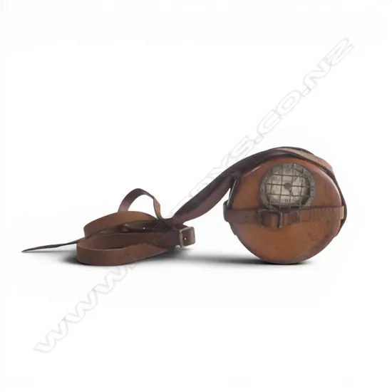 A vintage Llewellins Machine Co. Ltd. portable night watchman's clock,