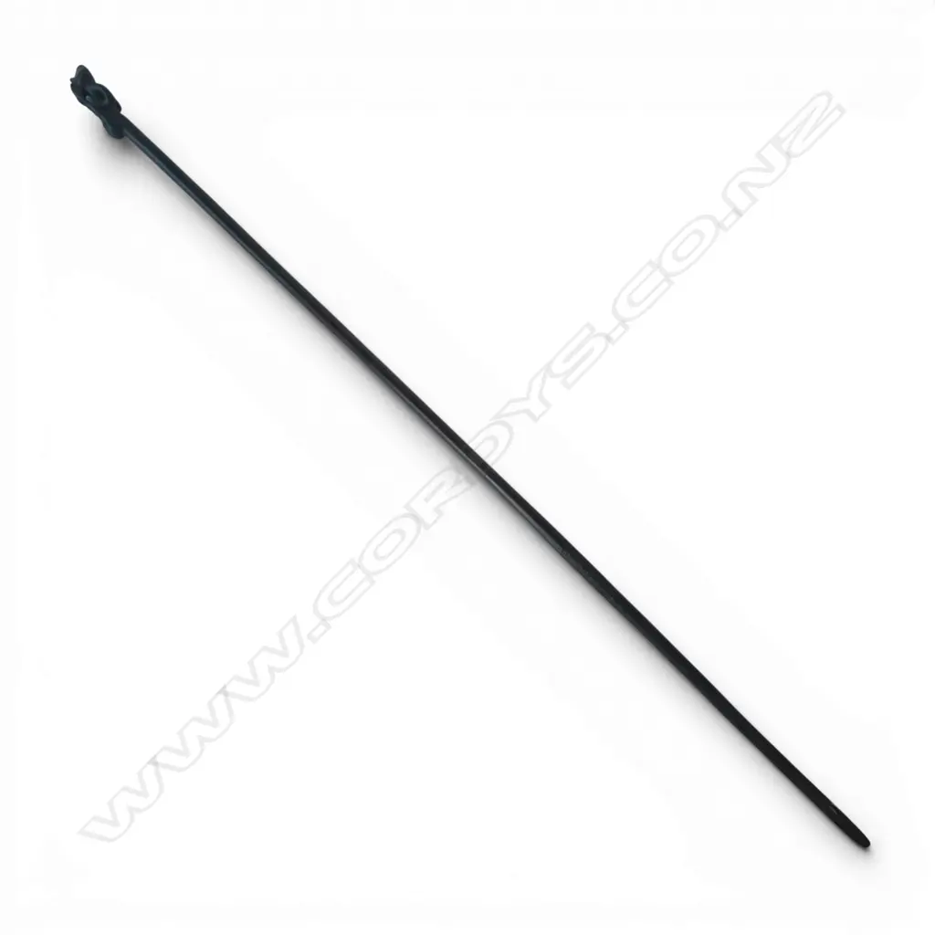 MAORI LONG STAFF (TOKOTKO) with stylised figure carved end legs raised to mouth. Probably 20thC. L.1430mm.  Image 1++