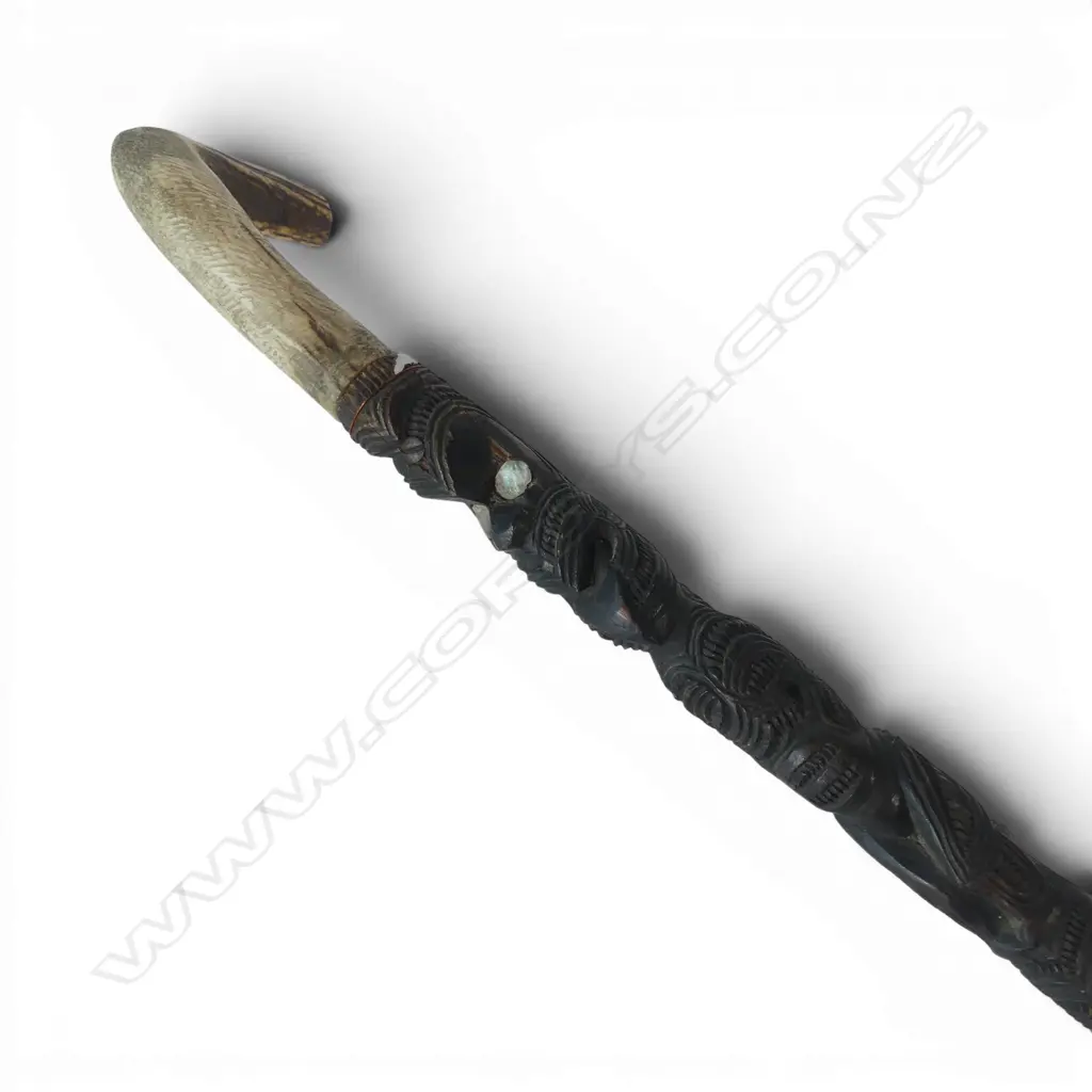 An old Maori carved walking stick (tokotoko) paua inserts + antler handle. L.900mm Image 1++
