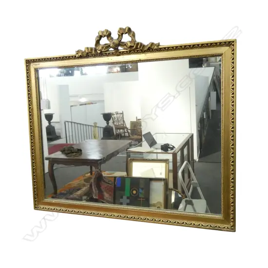 GILT FRAMED WALL MIRROR CARVED BOW TO TOP H530 W680MM