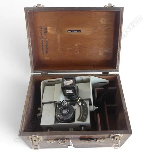 AUTOMATIC DIAL RECORDING CAMERA BY D. SHACKMAN & SONS IN MAHOGANY CASE W.340mm