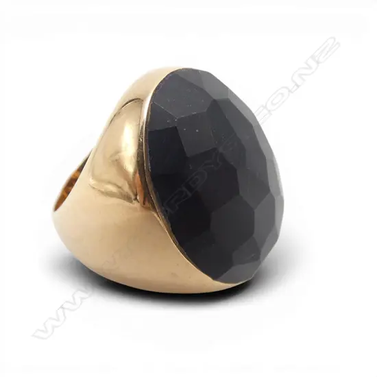 18ct & FACETED ONYX RING 26.57gms