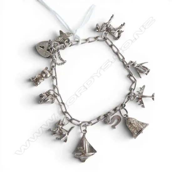 STG SILVER 10 CHARM BRACELET 17.7gms