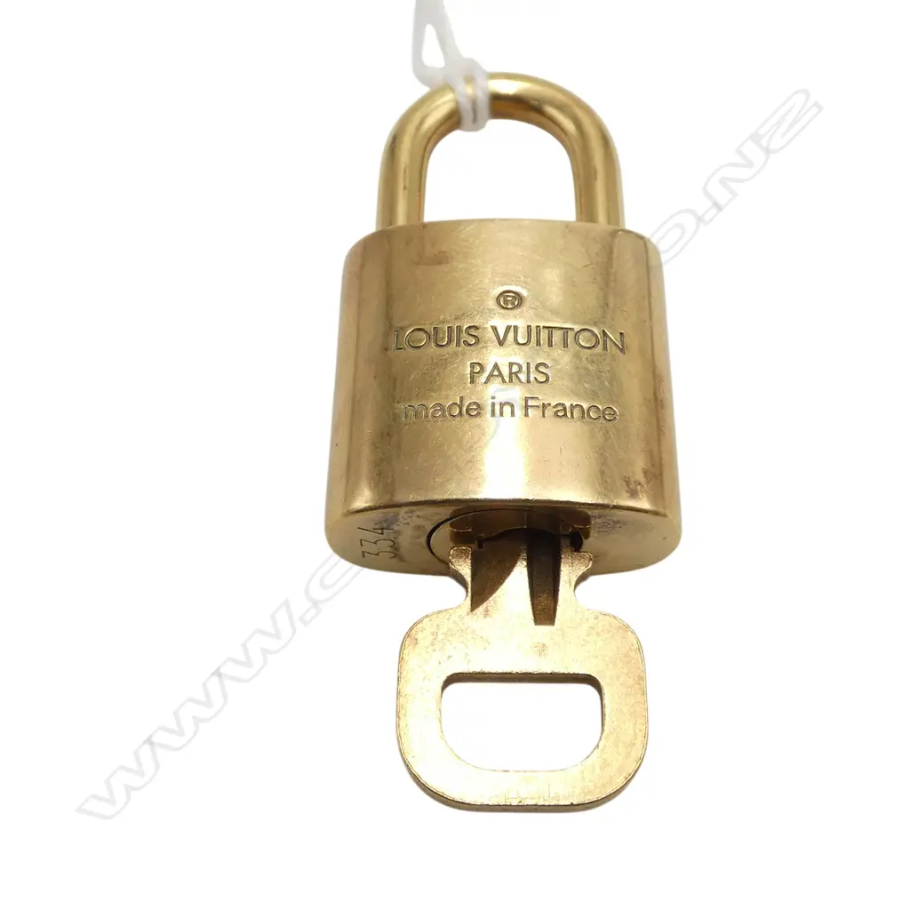 LOUIS VUITTON SML BRASS PADLOCK w KEY #334, authentication from myhaute.co.nz Image 1++