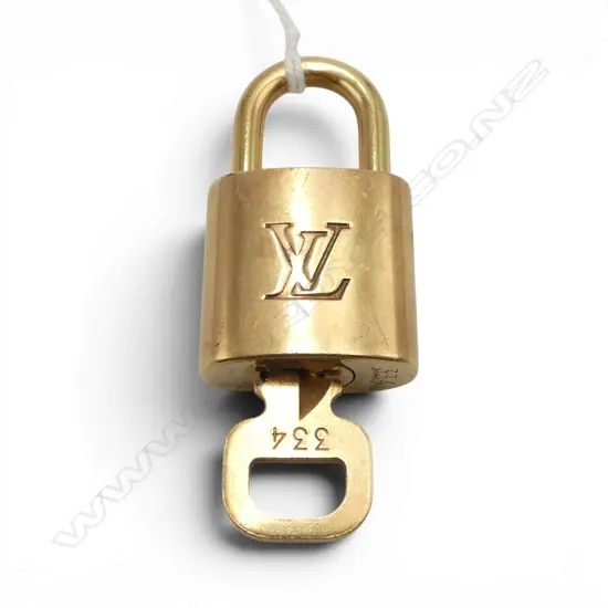LOUIS VUITTON SML BRASS PADLOCK w KEY #334, authentication from myhaute.co.nz