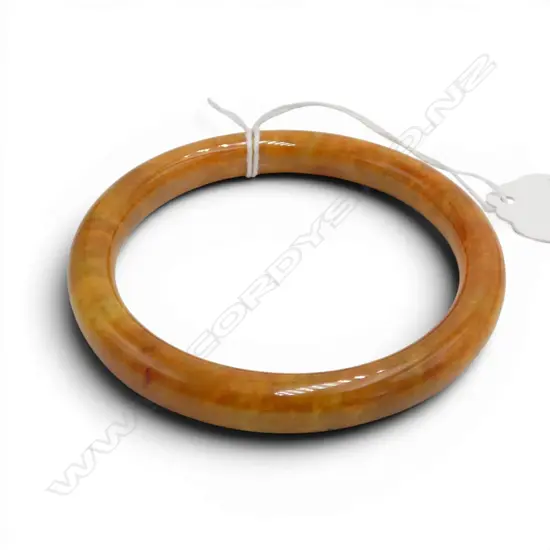 CHINESE JADE BANGLE mottled orange. Outer diameter 78mm