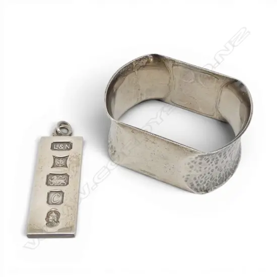 2 STG SILVER LARGE HALLMARKED ITEMS: ingot pendant + napkin ring. 34.7gms