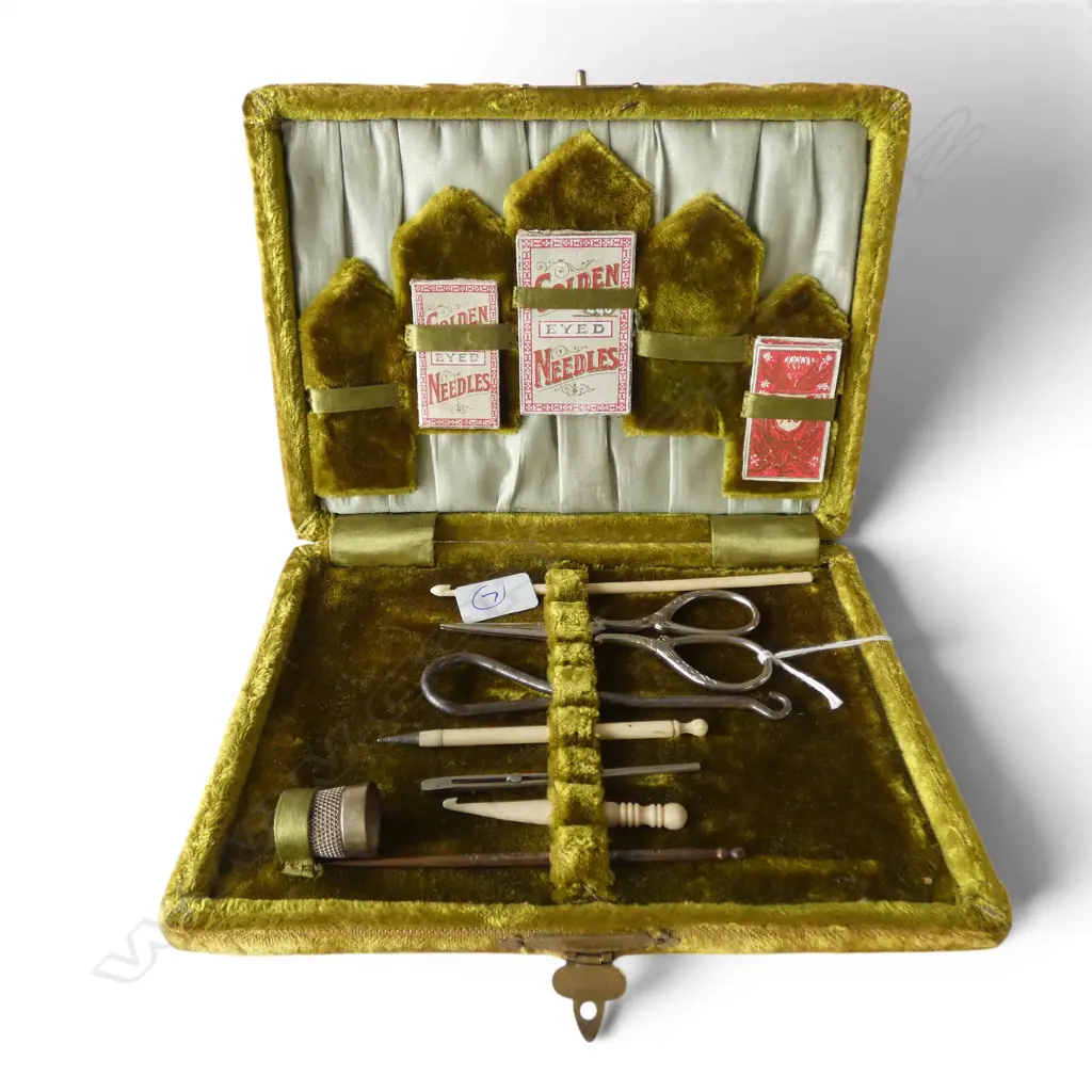 Early 20thC golden green velvet fitted sewing case with many implements. Image 1++