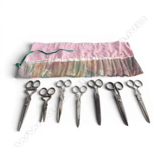 Roll of 7 antique scissors