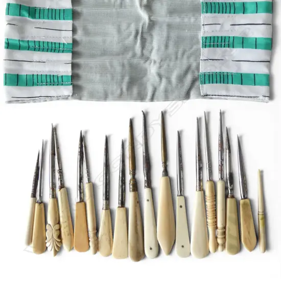 Linen case with approx. 18 bone + steel etc sewing tools