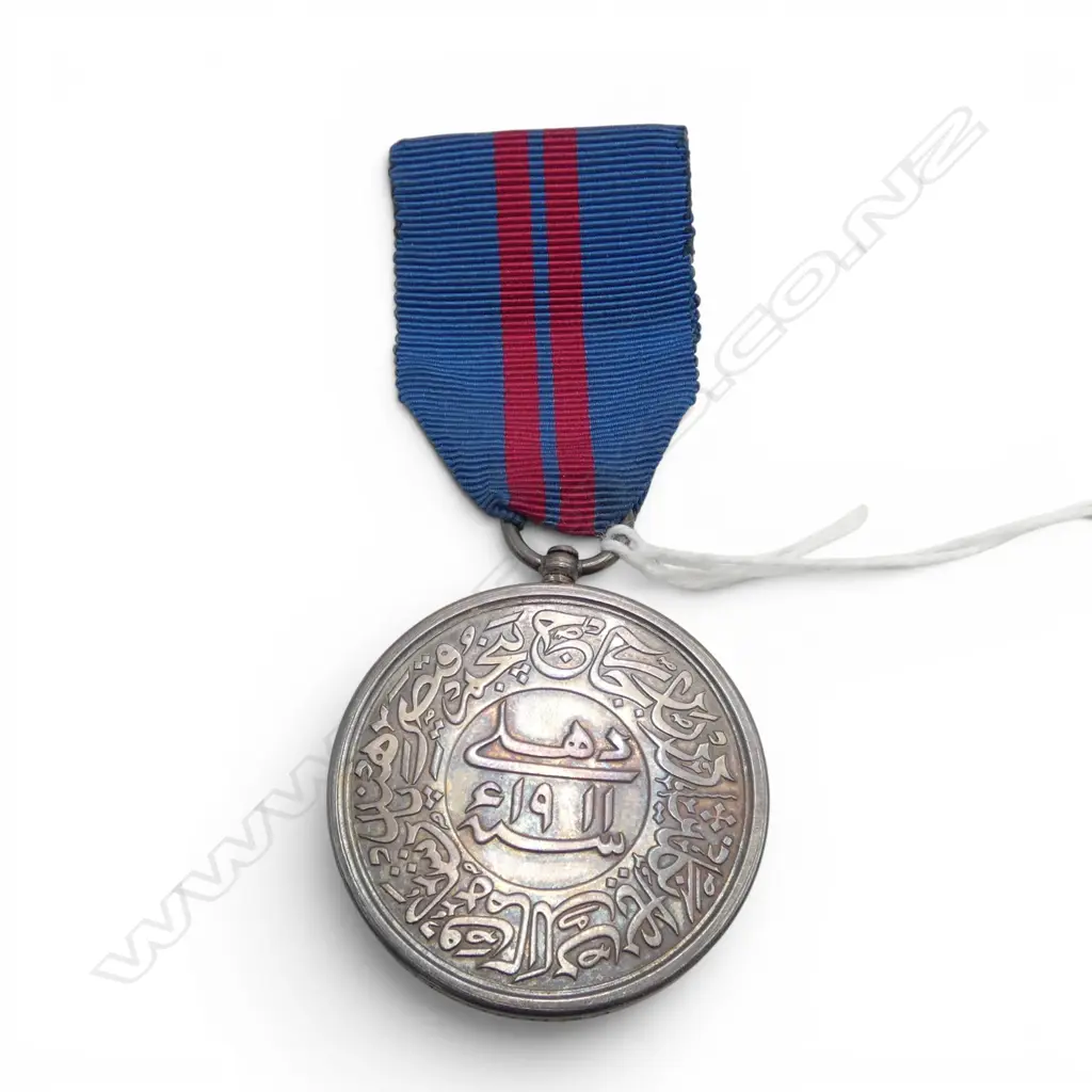 Note: This award was struck to celebrate the grand coronation of King George V and Queen Mary as Emperor and Empress of India. Issued in 1911 Image 1++