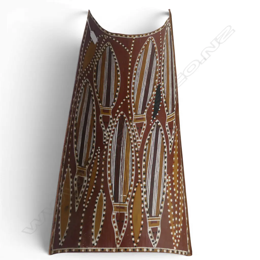 BRIAN NYINAWANGA (AUSTRALIAN ABORIGINAL c.1935) NATURAL PIGMENTS ON BARK 630 x 240MM (LABEL WITH ARTIST'S DETAILS VERSO) Image 1++