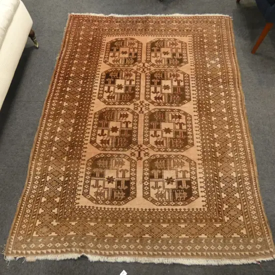HAND KNOTTED ALL WOOL TURKMEN RUG, faded with small faults 1900x1450mm