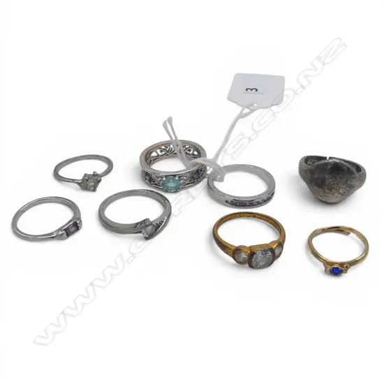 8 DRESS RINGS: includes 3 silver. Some gem set