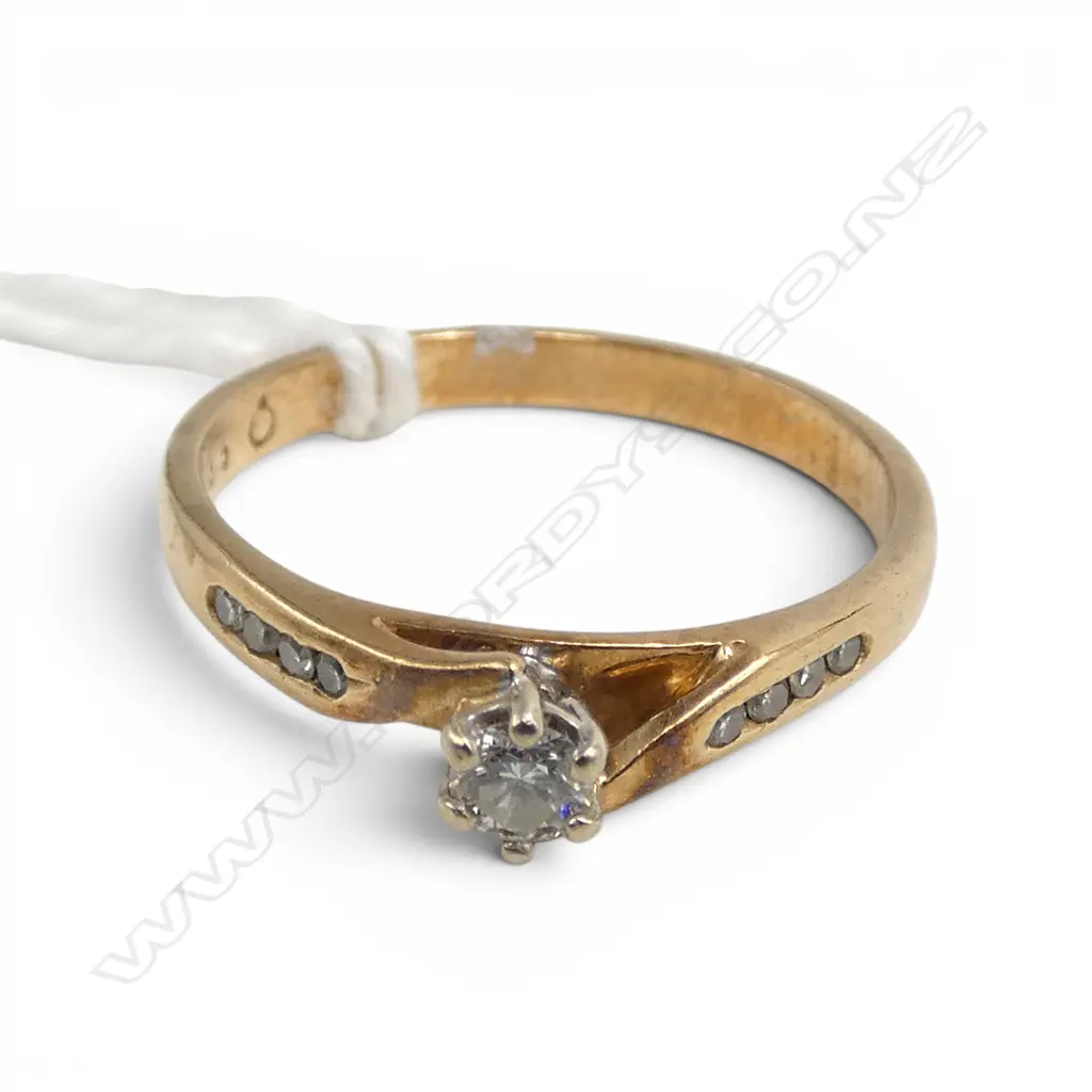 9CT SOL. DIAMOND RING with shoulder diamonds 1.9gms SIZE O Image 1++