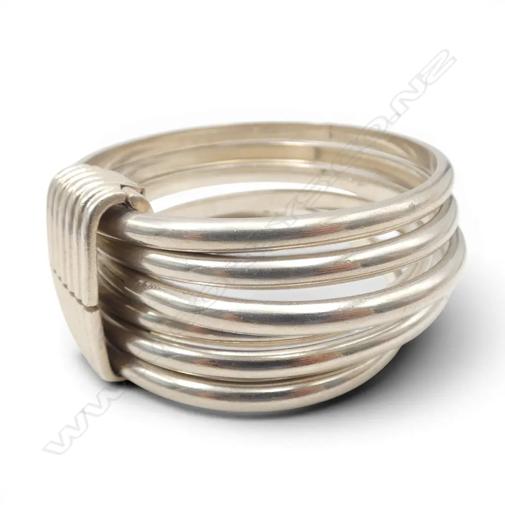 "POMELLATO" STG SILVER BRACELET (6 HELD BY HINGED CLASP) 200gms approx 6.5cm inside diam. Image 1++