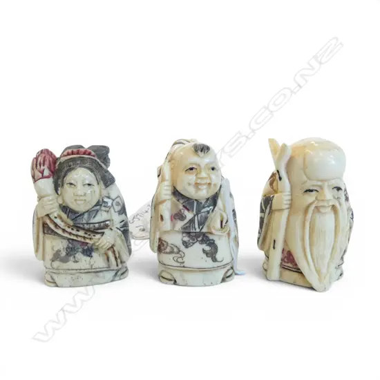 THREE CARVED BONE NETSUKE H.50mm