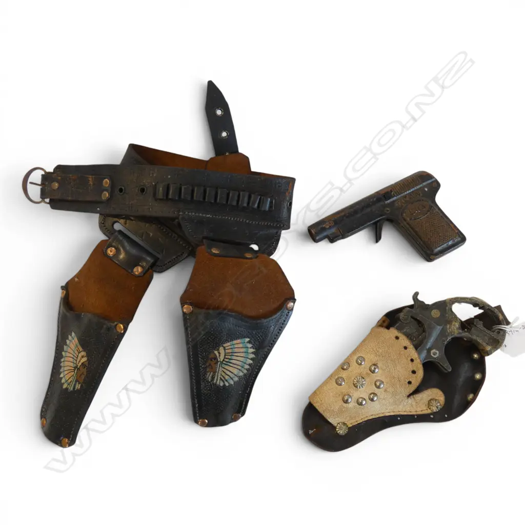 TWO VINTAGE TOY PISTOLS + TWO COWBOY HOLSTERS Image 1++